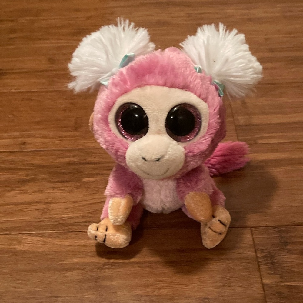 Pink and white monkey